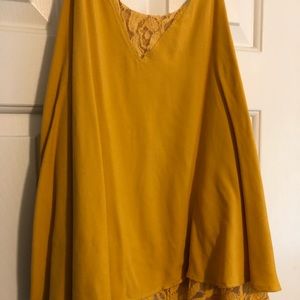 Francesca’s yellow tank top